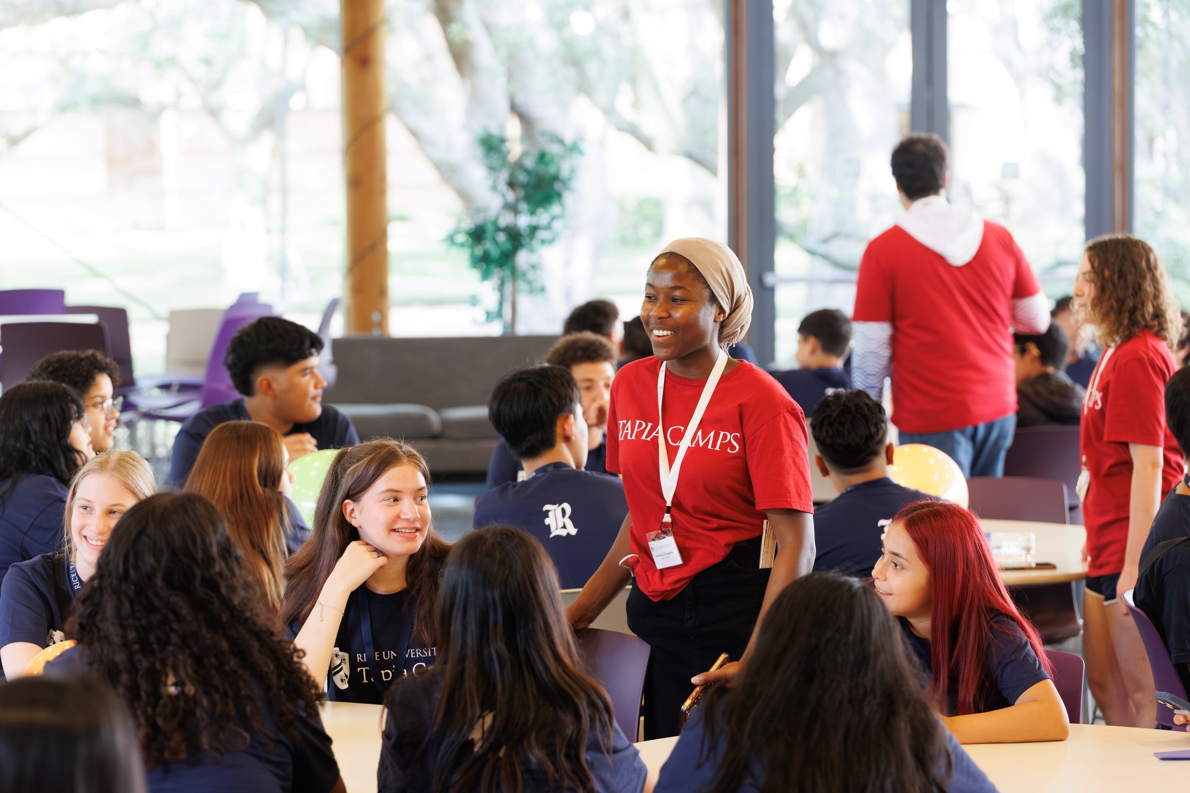 Counselor talking to campers