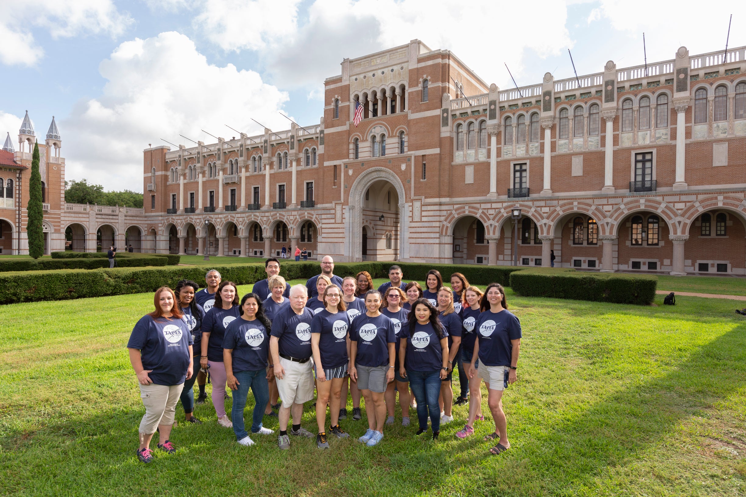 Tapia Educators stand in front of Lovett Hall as a group.